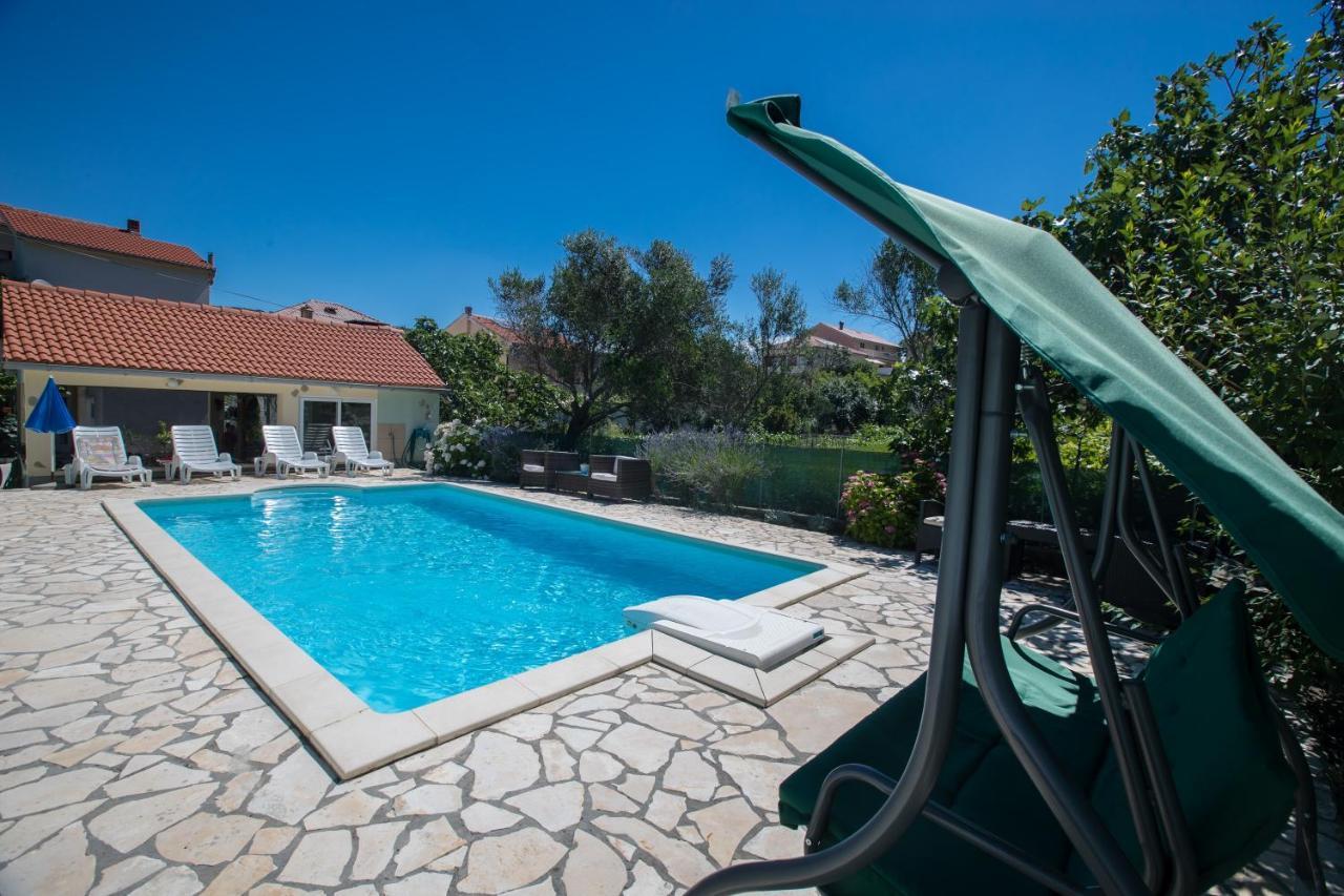 Family friendly apartments with a swimming pool Supetarska Draga - Donja, Rab - 2019 Bagian luar foto